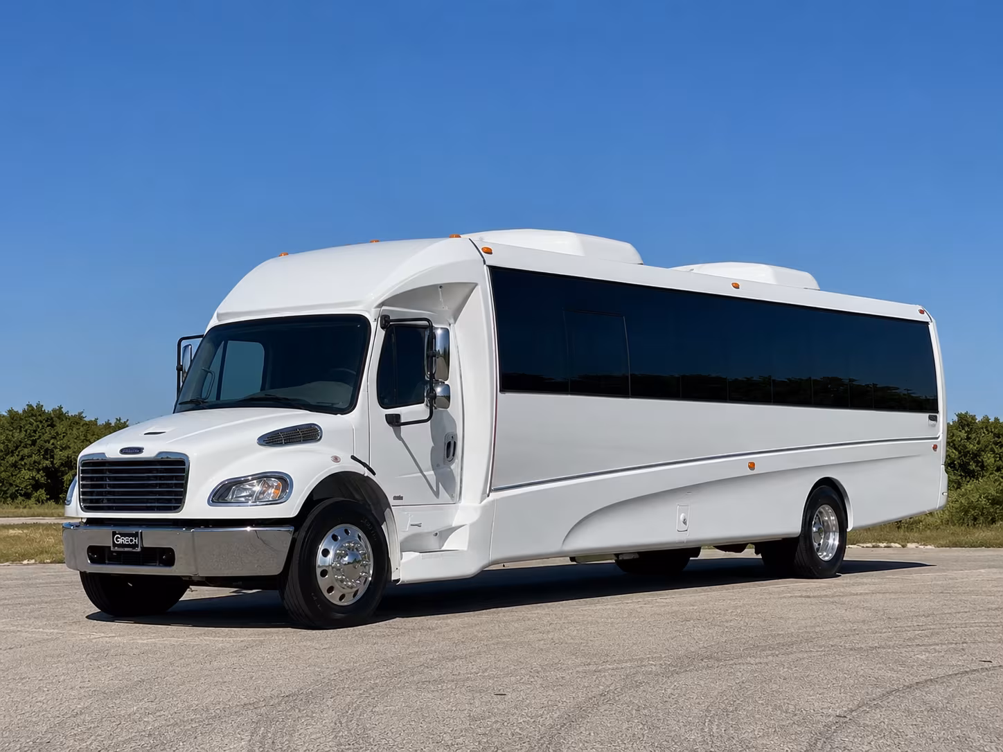 Group beside a Mercedes Sprinter limo in Fort Lee
